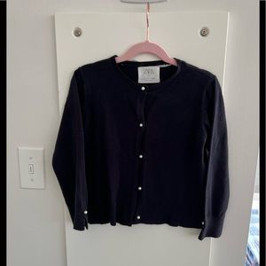 Navy blue cotton cardigan for little girls.